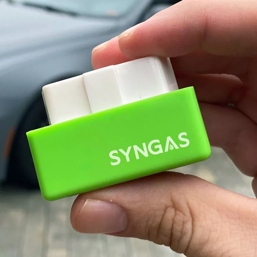 SynGas OBD2 fuel saver device held in hand