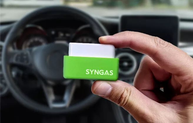 Driver holding SynGas device ready to use